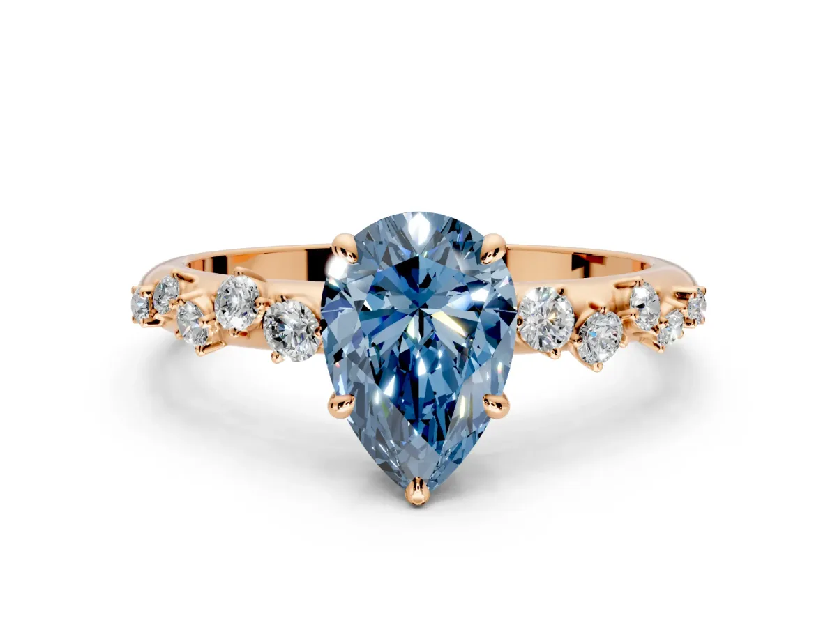 Cluster Engagement Ring Setting for Fancy Blue Pear-Shaped Center with Round Cut Accent Band and Prong Head in Rose Gold