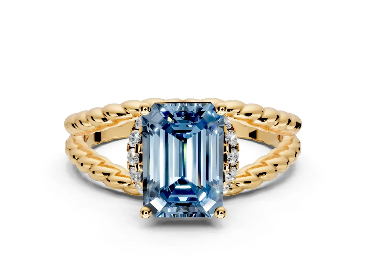 Halo Engagement Ring Setting for Fancy Blue Emerald Cut Center with Rope Twist Split Shank and Prong Head in Yellow Gold