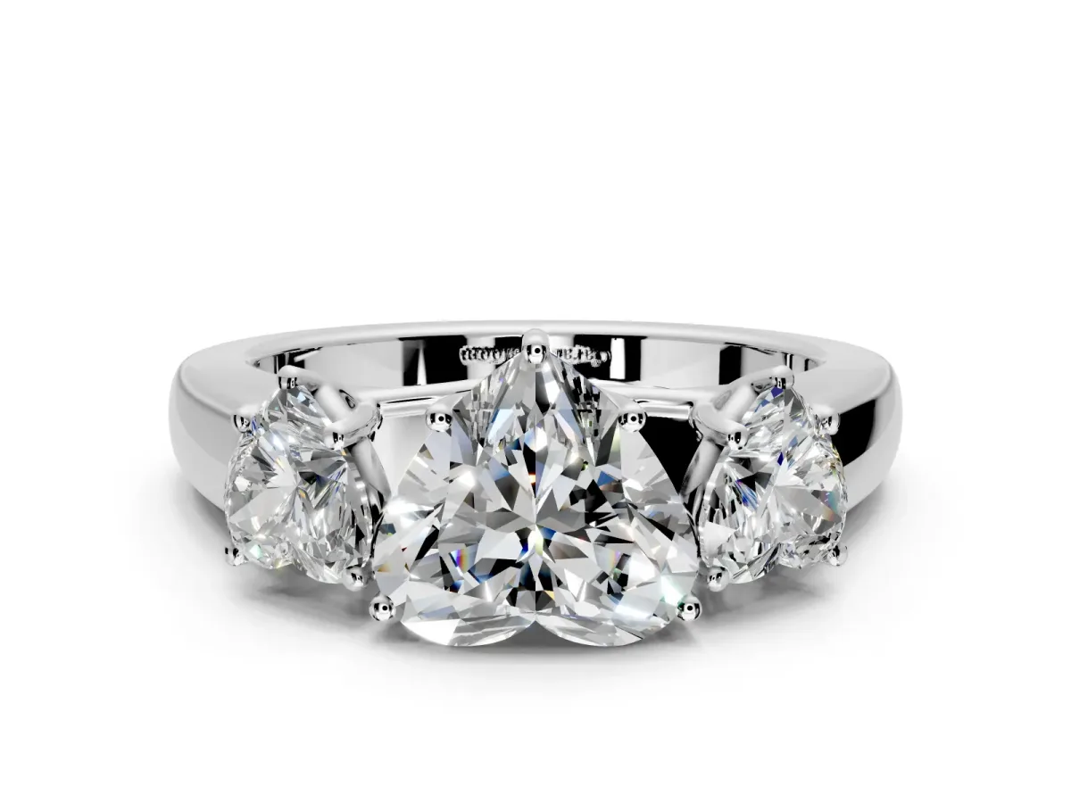 3 Stone Engagement Ring Setting for Heart-Shaped Center with Raised Basket Heads and Prong Head in White Gold
