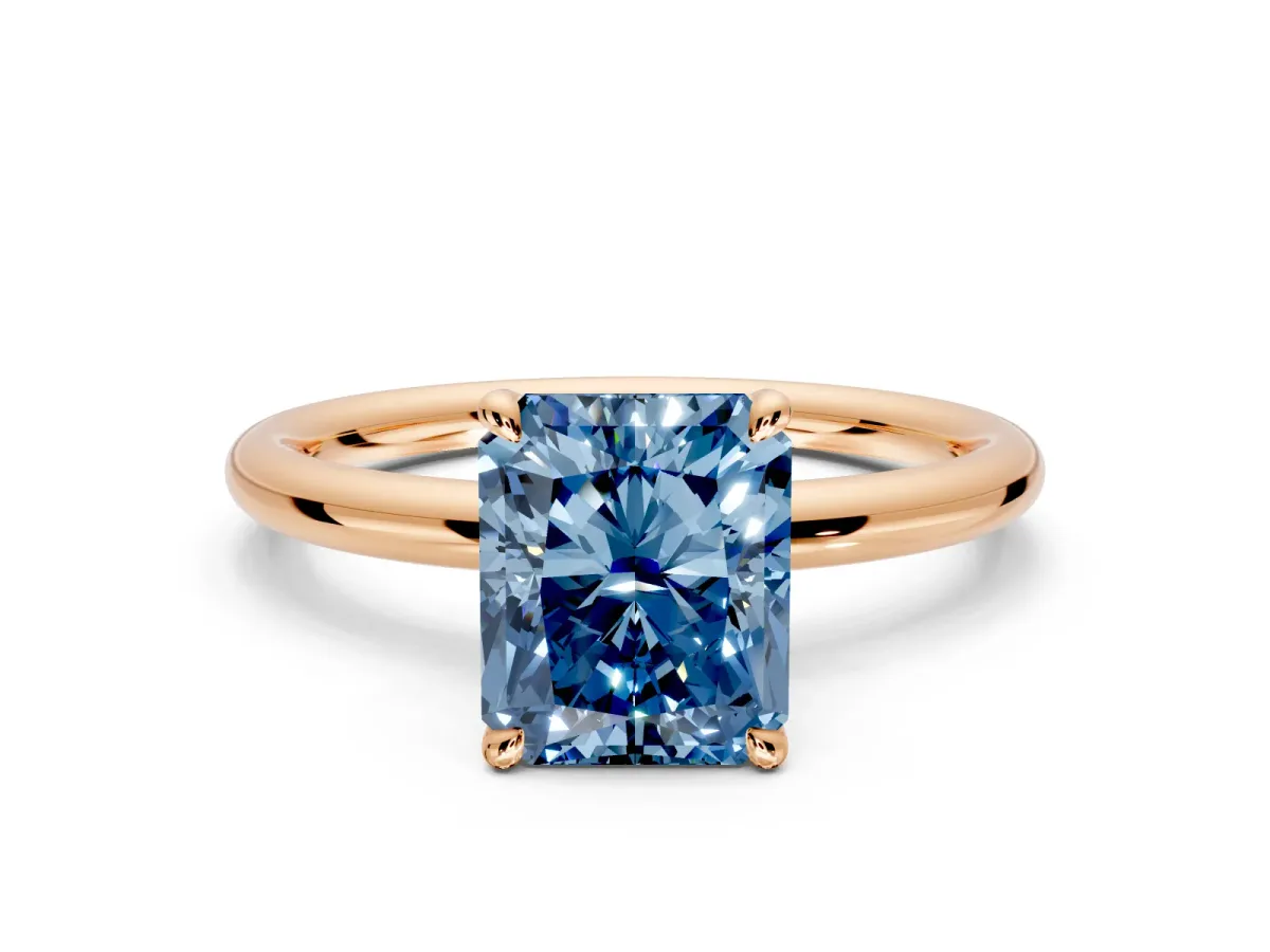 Hidden Halo Engagement Ring Setting for Fancy Blue Radiant Cut Center with Thin Rounded Band and Prong Head in Rose Gold