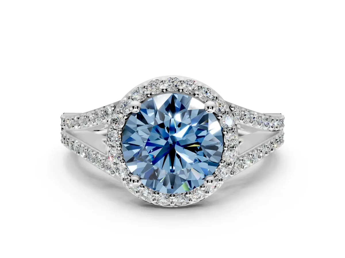 Halo Engagement Ring Setting for Fancy Blue Round Cut Center with Pave Split Shank and Prong Head in White Gold