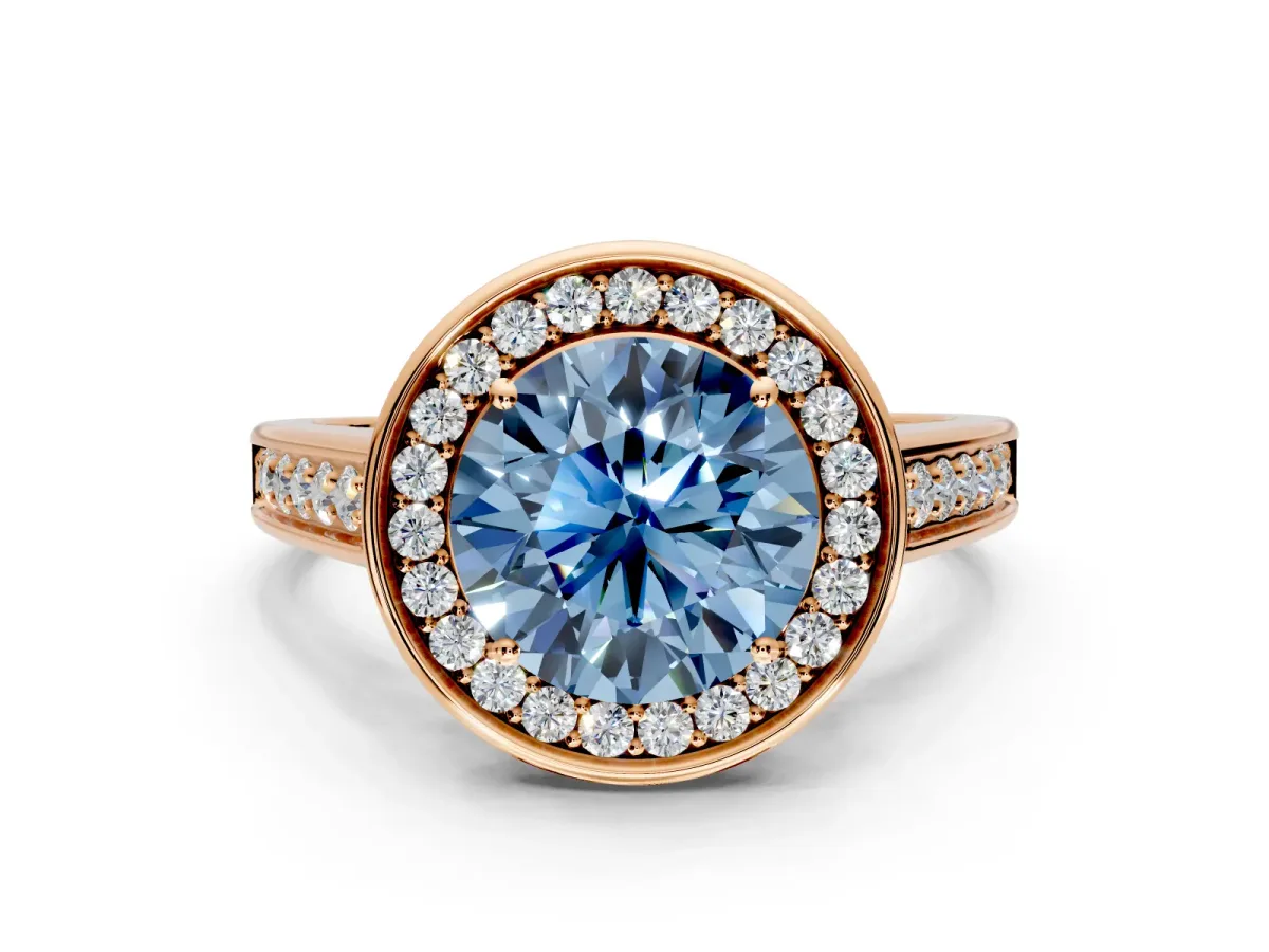 Halo Engagement Ring Setting for Fancy Blue Round Cut Center with Outer Bezel Rim, Pave Band and Prong Head in Rose Gold