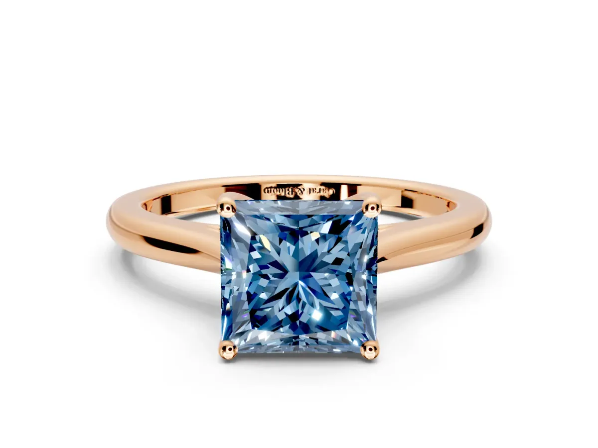 Solitaire Engagement Ring Setting for Fancy Blue Princess Cut Center with Narrow Cathedral Band and Prong Head in Rose Gold