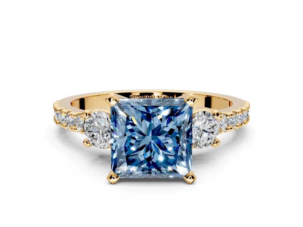 3 Stone Engagement Ring Setting for Fancy Blue Princess Cut Center with Round Cut Side Accents and Prong Head in Yellow Gold