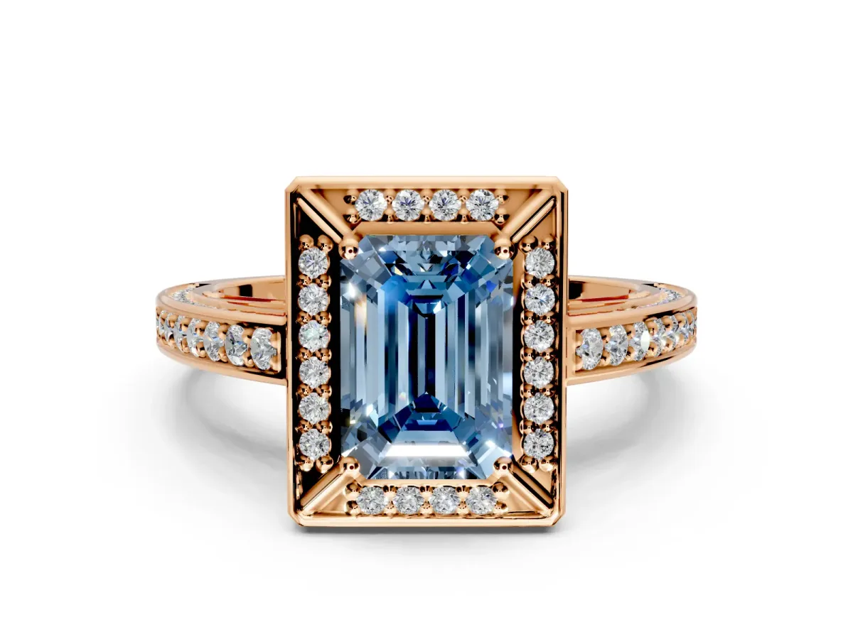Halo Engagement Ring Setting for Fancy Blue Emerald Cut Center with Framed Halo, Pave Band and Prong Head in Rose Gold