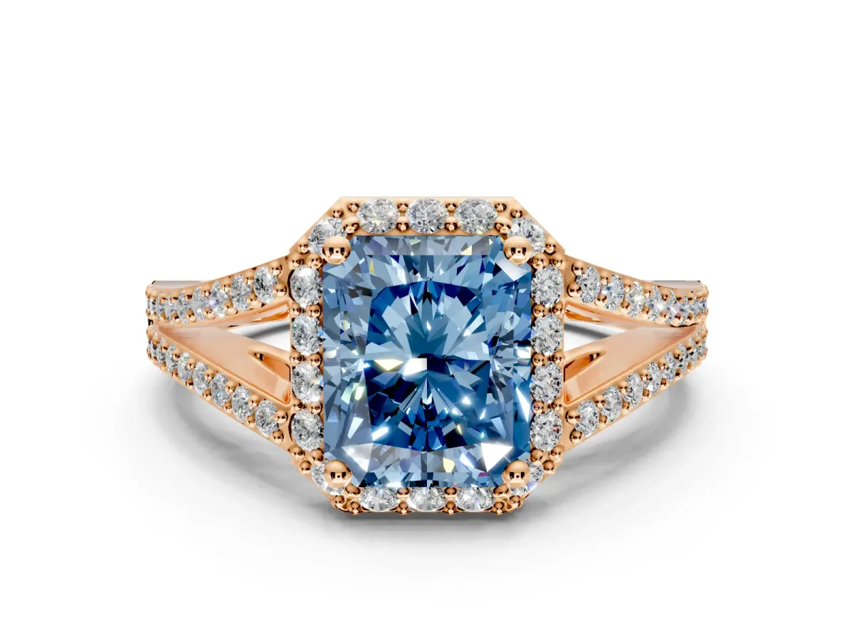 Halo Engagement Ring Setting for Fancy Blue Radiant Cut Center with Pave Split Shank and Prong Head in Rose Gold