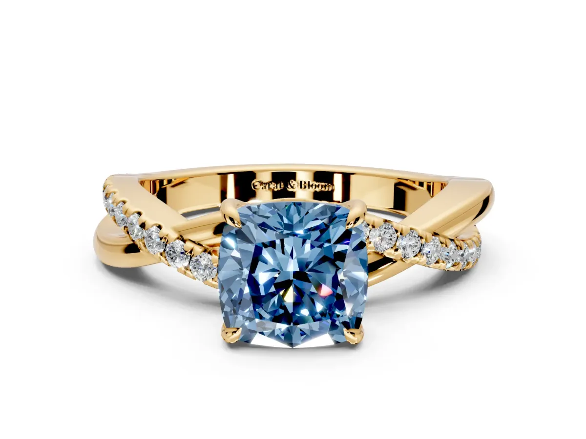 Crossover Engagement Ring Setting for Fancy Blue Cushion Cut Center with Pave and Plain Strands and Prong Head in Yellow Gold