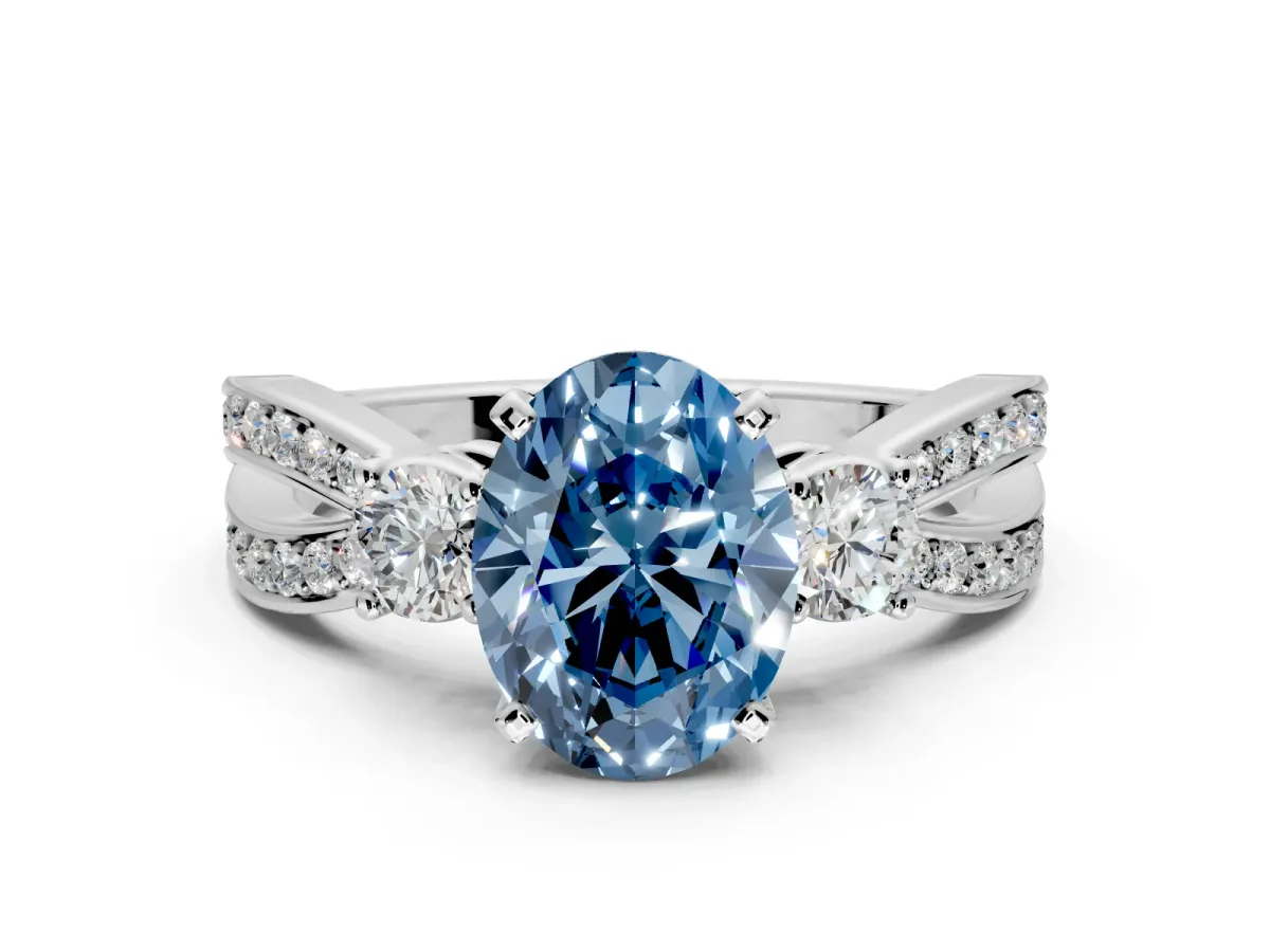 3 Stone Engagement Ring Setting for Fancy Blue Oval Center with Pave Twist Band and Prong Head in White Gold