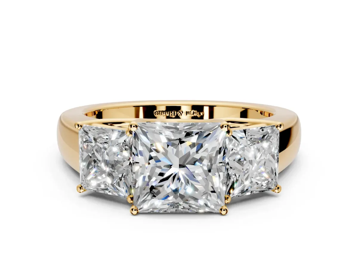 3 Stone Engagement Ring Setting for Princess Cut Center with Raised Basket Heads and Prong Head in Yellow Gold