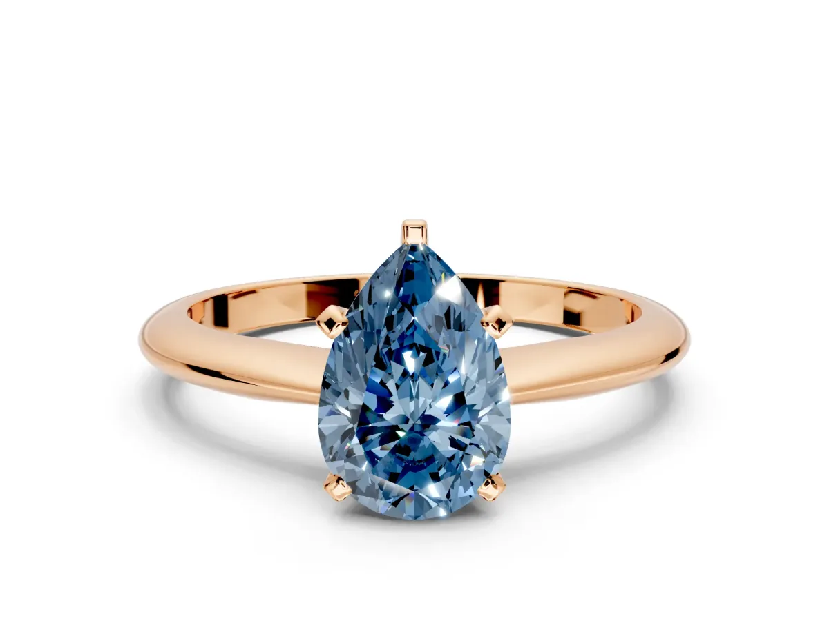 Solitaire Engagement Ring Setting for Fancy Blue Pear-Shaped Center with Knife Ridge Band and Claw Prong Head in Rose Gold