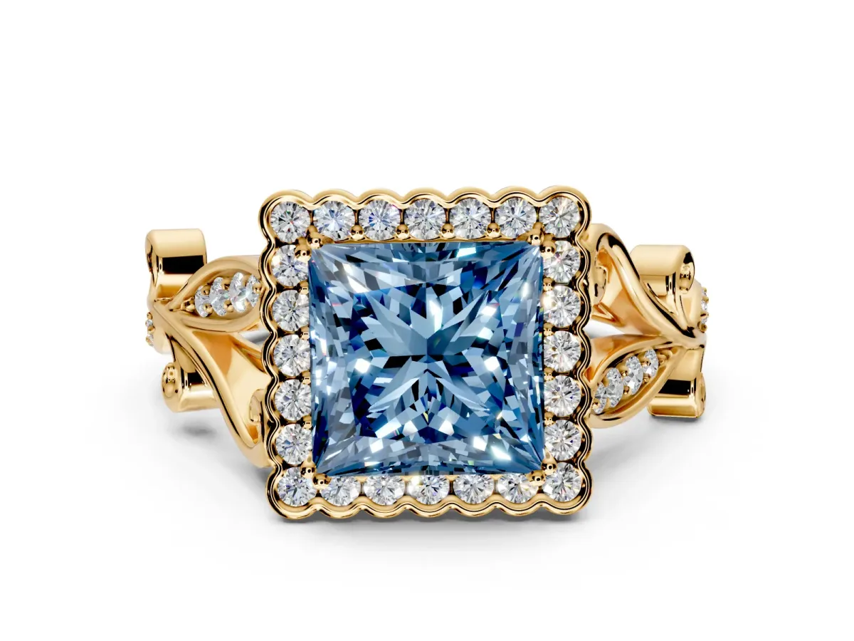 Halo Engagement Ring Setting for Fancy Blue Princess Cut Center with Leaf Motif Split Shank and Prong Head in Yellow Gold