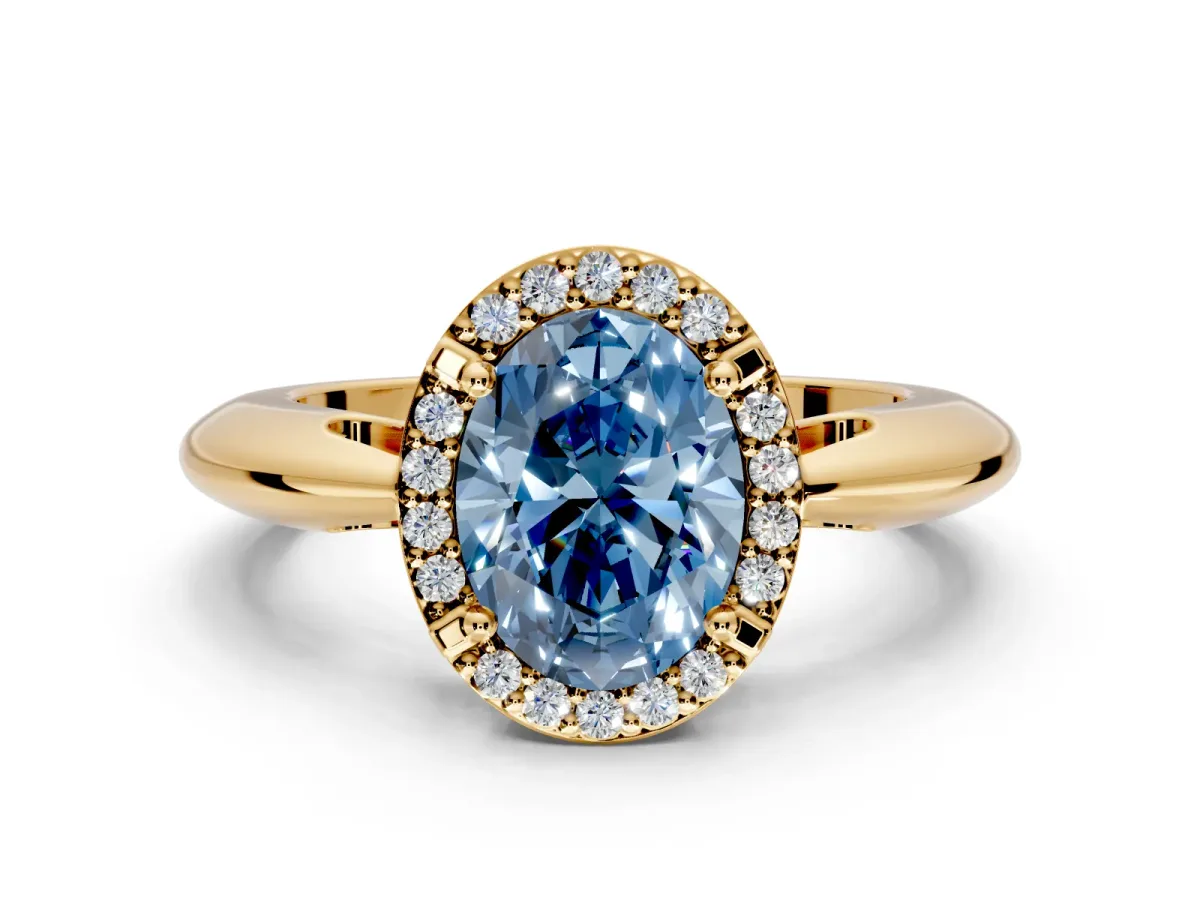 Halo Engagement Ring Setting for Fancy Blue Oval Center with Tapered Plain Band and Prong Head in Yellow Gold