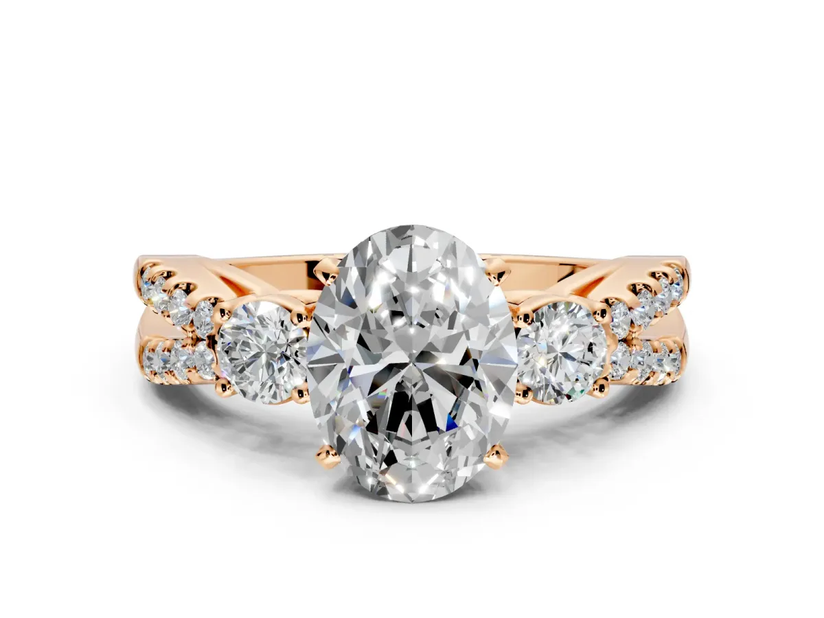 3 Stone Engagement Ring Setting for Oval Center with Pave Split Shank and Prong Head in Rose Gold