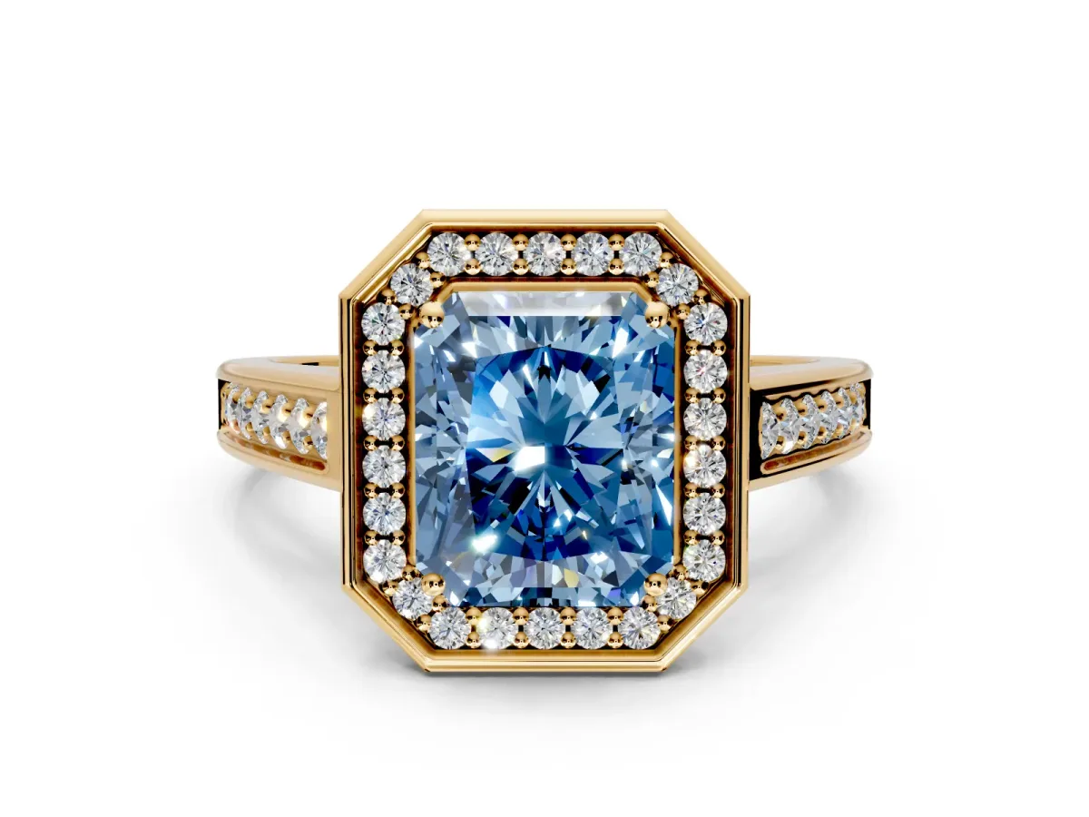 Halo Engagement Ring Setting for Fancy Blue Emerald Cut Center with Outer Bezel Rim, Pave Band and Prong Head in Yellow Gold