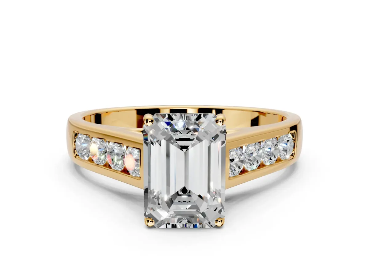 Solitaire Engagement Ring Setting for Emerald Cut Center with Round Cut Channel Band and Prong Head in Yellow Gold