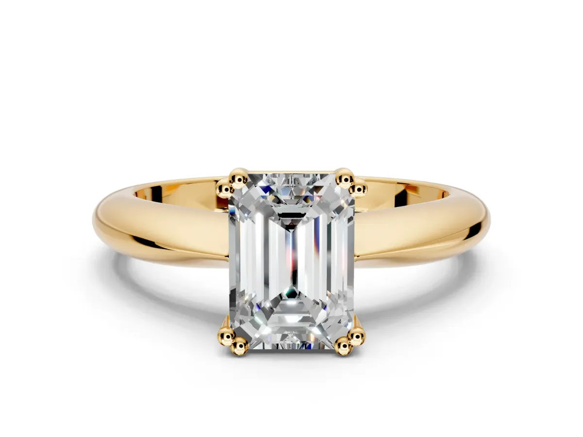 Solitaire Engagement Ring Setting for Emerald Cut Center with Reverse Tapered Band and Prong Head in Yellow Gold