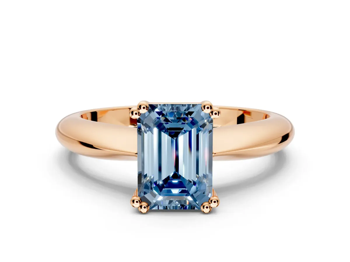 Solitaire Engagement Ring Setting for Fancy Blue Emerald Cut Center with Reverse Tapered Band and Prong Head in Rose Gold