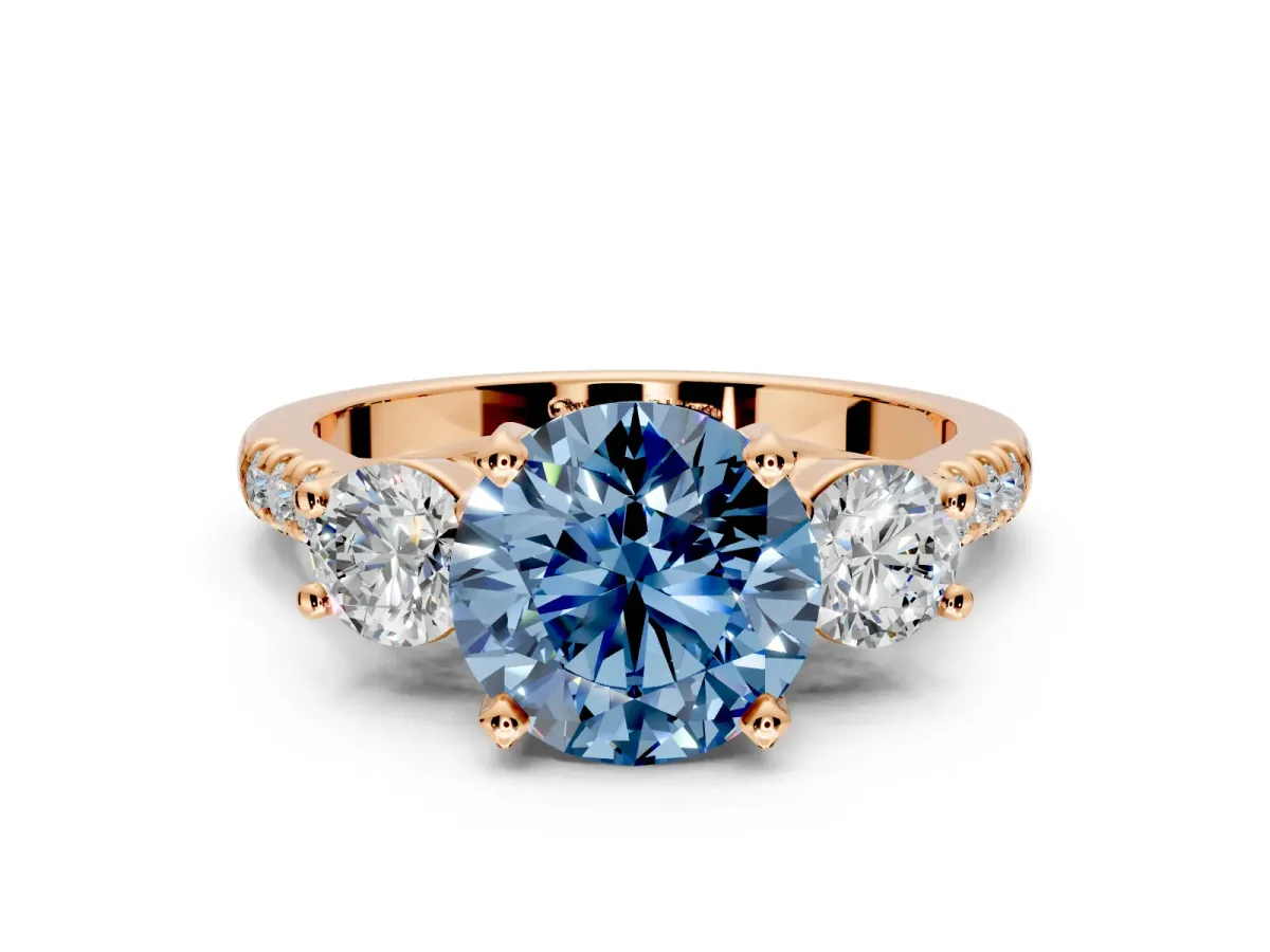 3 Stone Engagement Ring Setting for Fancy Blue Round Cut Center with Crossover Basket, Pave Band and Prong Head in Rose Gold