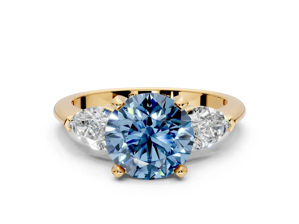 3 Stone Engagement Ring Setting for Fancy Blue Round Cut Center with Large Pear-Shaped Accents and Prong Head in Yellow Gold