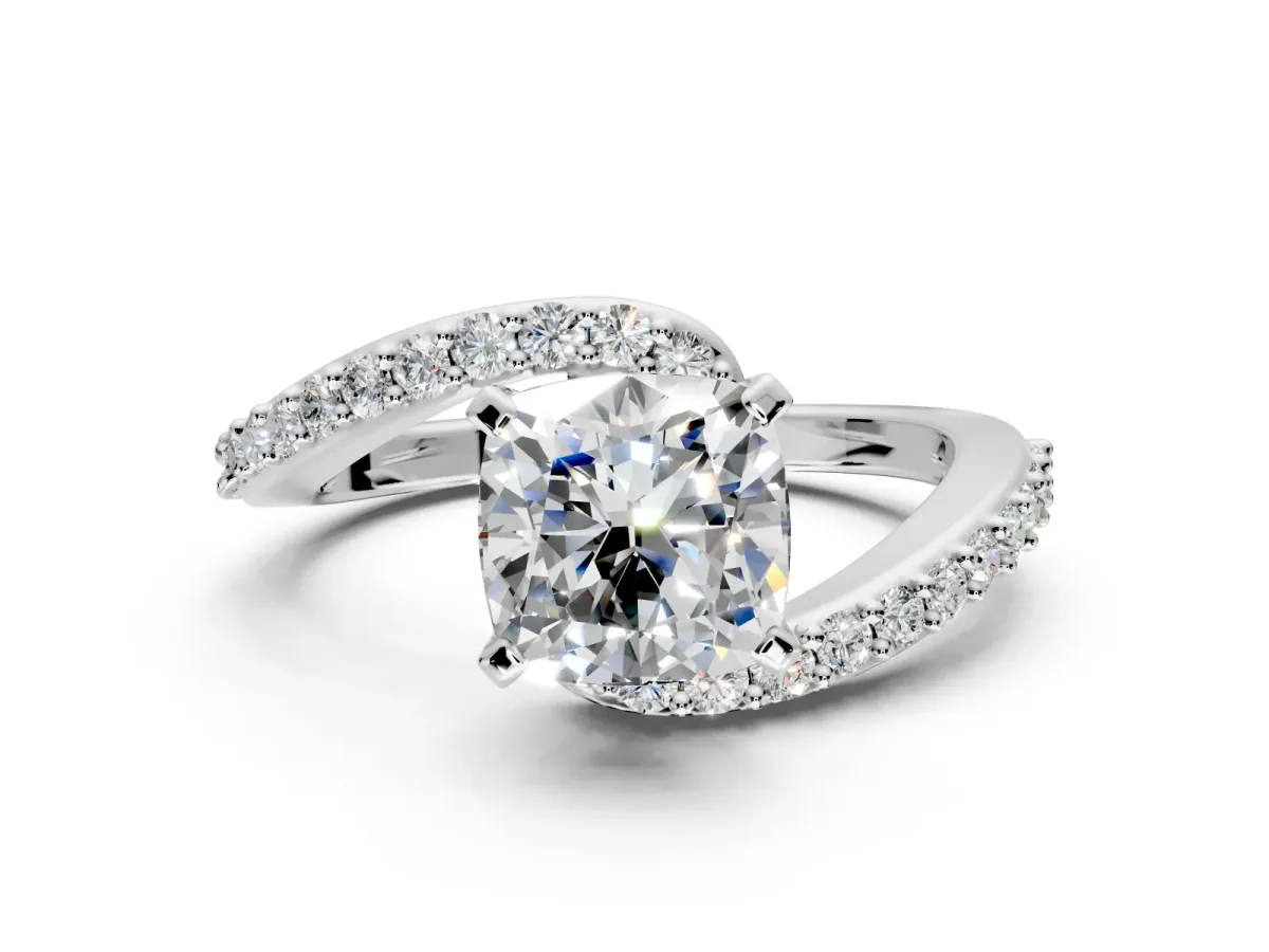 Solitaire Engagement Ring Setting for Cushion Cut Center with Pave Bypass Swirl Band and Prong Head in Platinum