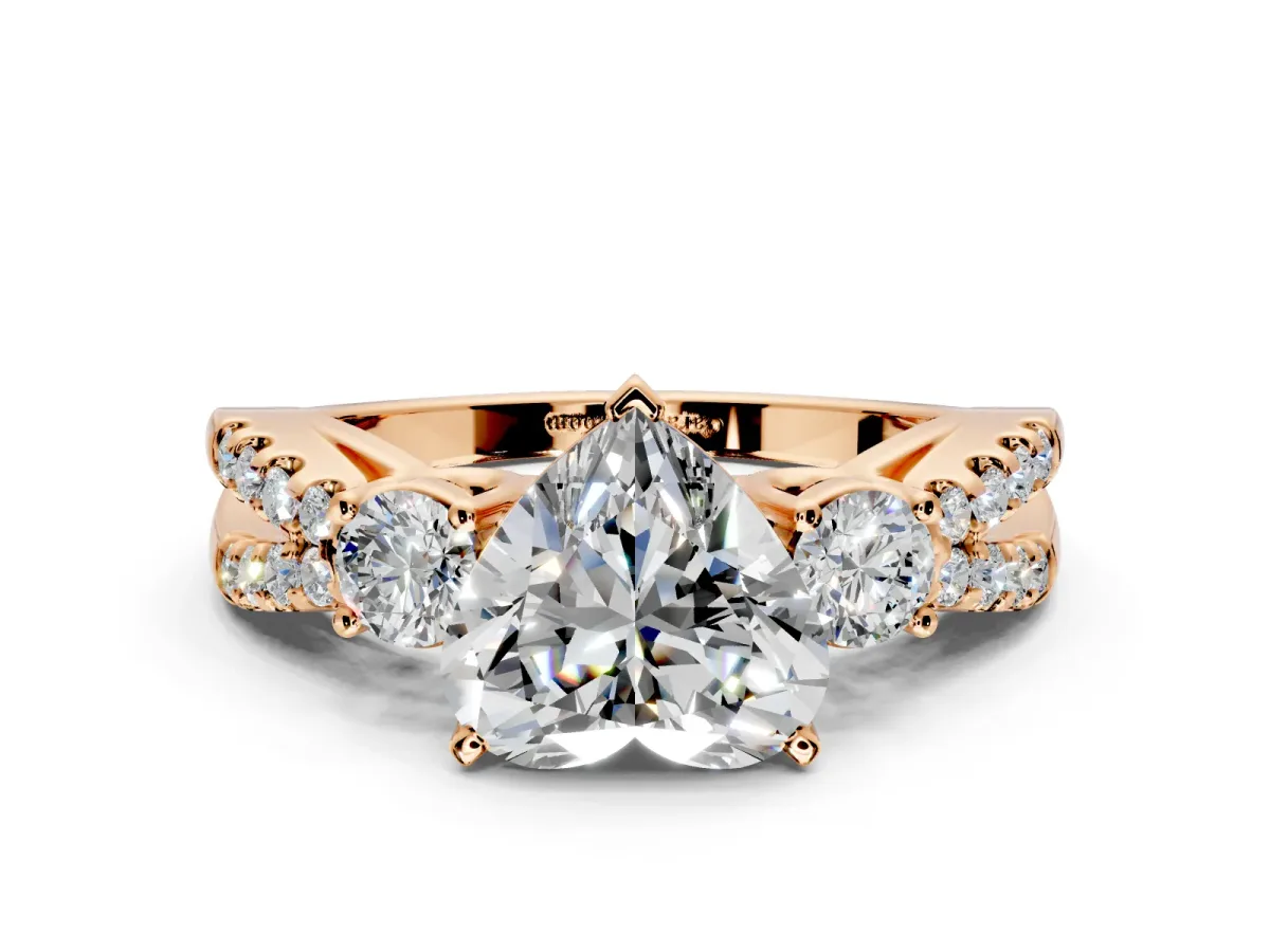 3 Stone Engagement Ring Setting for Heart-Shaped Center with Pave Split Shank and Prong Head in Rose Gold