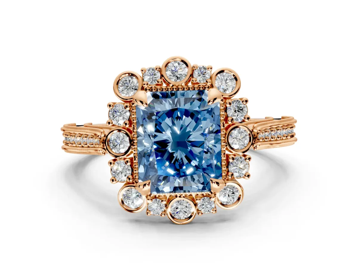 Milgrain Halo Engagement Ring Setting for Fancy Blue Radiant Cut Center with Bezel Point Accents and Prong Head in Rose Gold