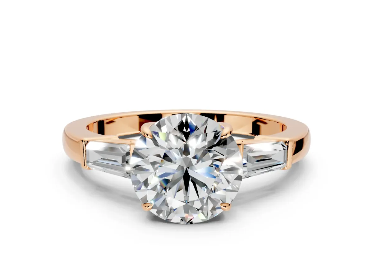 3 Stone Engagement Ring Setting for Round Cut Center with Baguette Accents and Prong Head in Rose Gold
