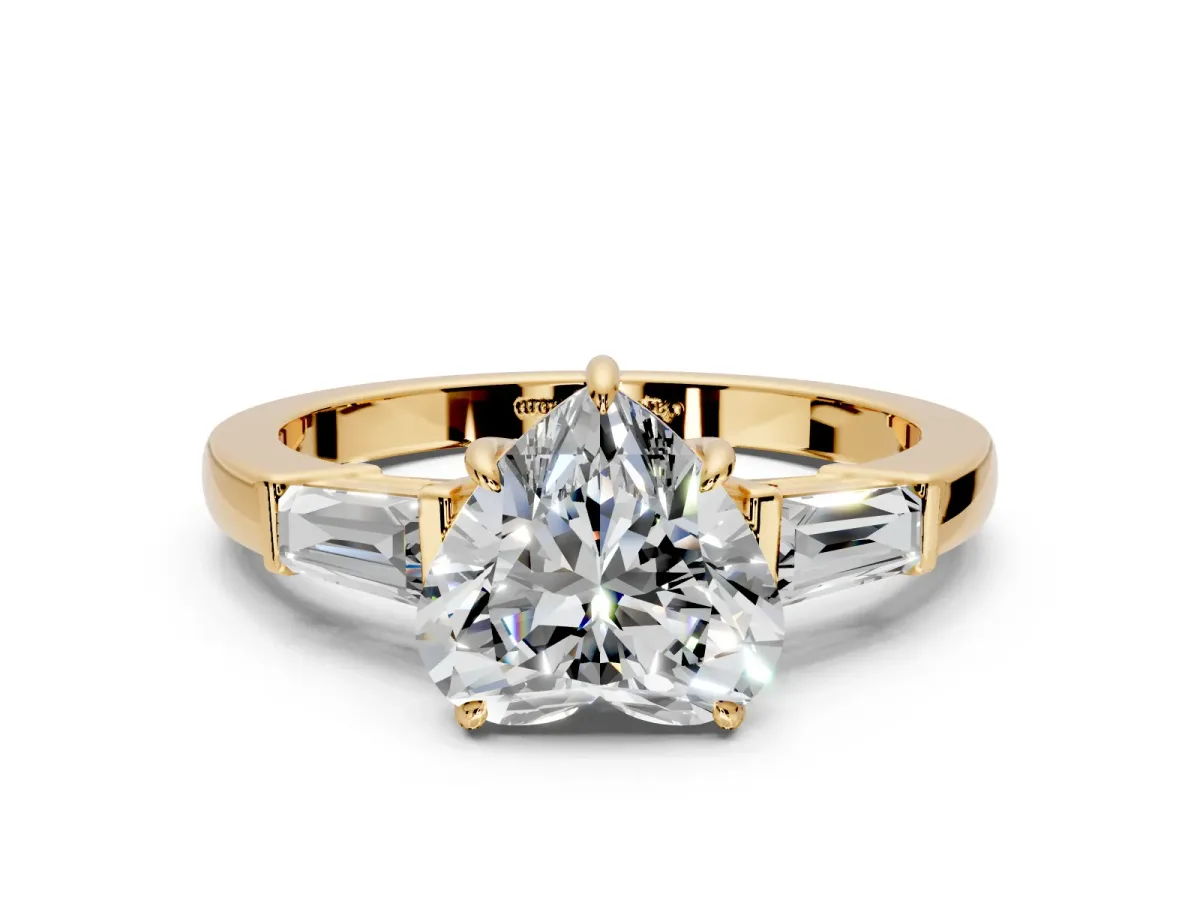 3 Stone Engagement Ring Setting for Heart-Shaped Center with Baguette Accents and Prong Head in Yellow Gold