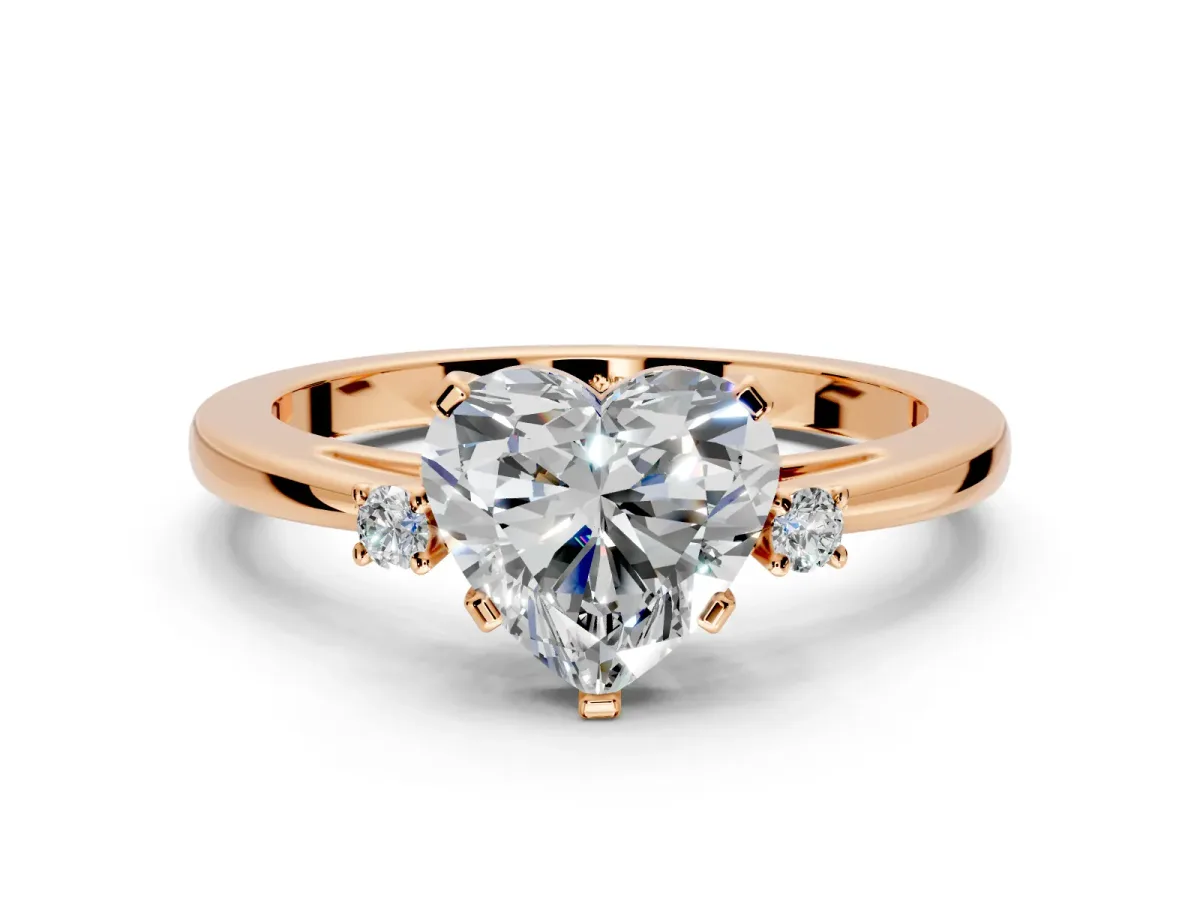 3 Stone Engagement Ring Setting for Heart-Shaped Center with Low-Set Round Cut Accents and Prong Head in Rose Gold