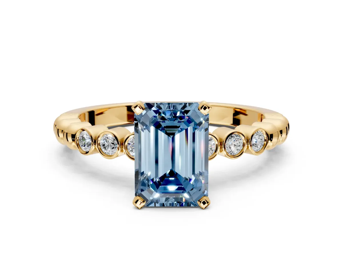Solitaire Engagement Ring Setting for Fancy Blue Emerald Cut Center with Bezel-Dot Beaded Band and Prong Head in Yellow Gold