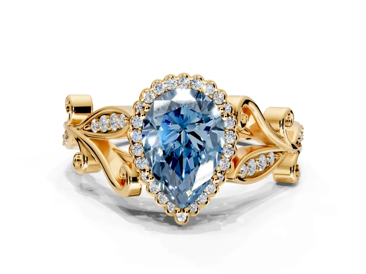 Halo Engagement Ring Setting for Fancy Blue Pear-Shaped Center with Leaf Motif Split Shank and Prong Head in Yellow Gold