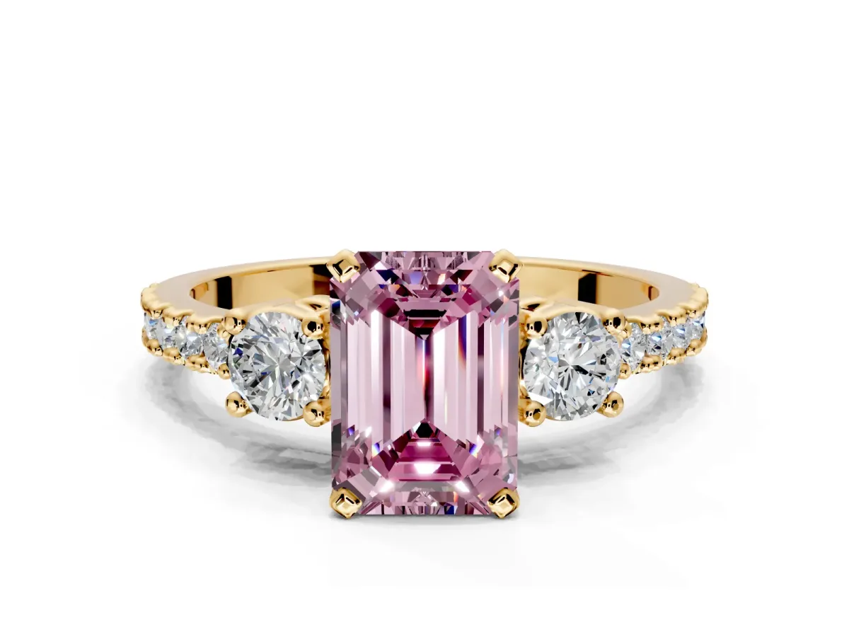 3 Stone Engagement Ring Setting for Fancy Pink Emerald Cut Center with Round Cut Side Accents and Prong Head in Yellow Gold