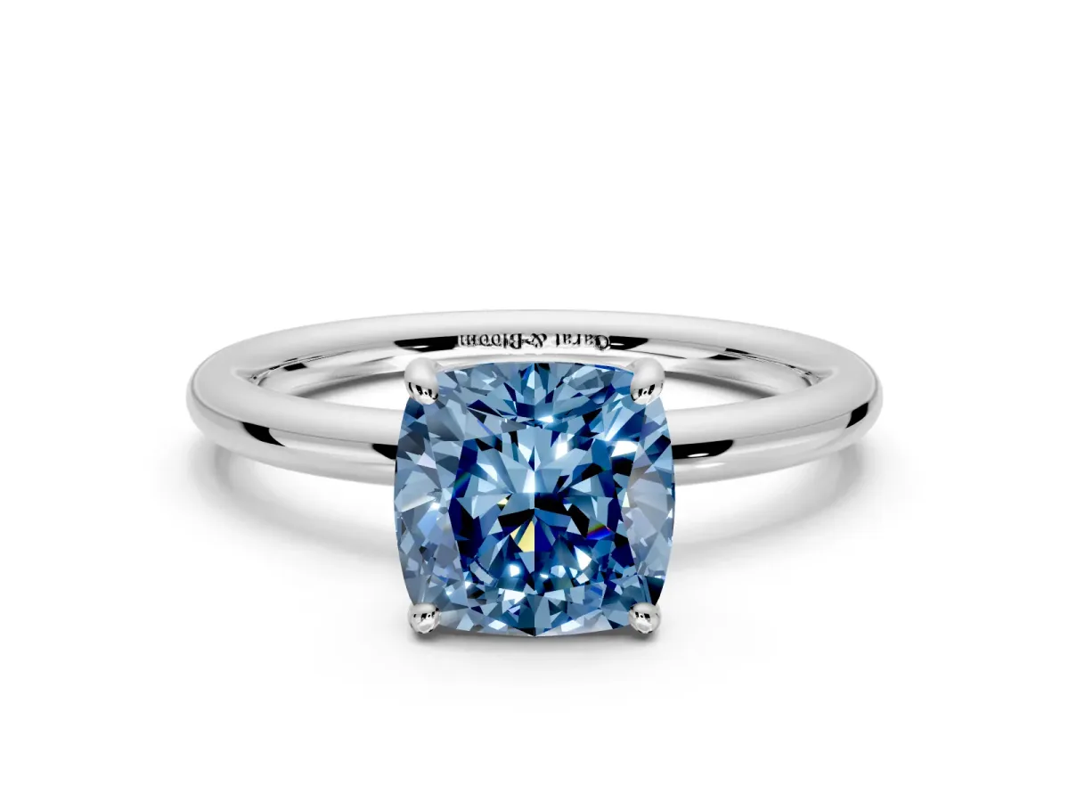 Low-Set Solitaire Engagement Ring Setting for Fancy Blue Cushion Cut Center with Thin Plain Band and Prong Head in Sterling Silver