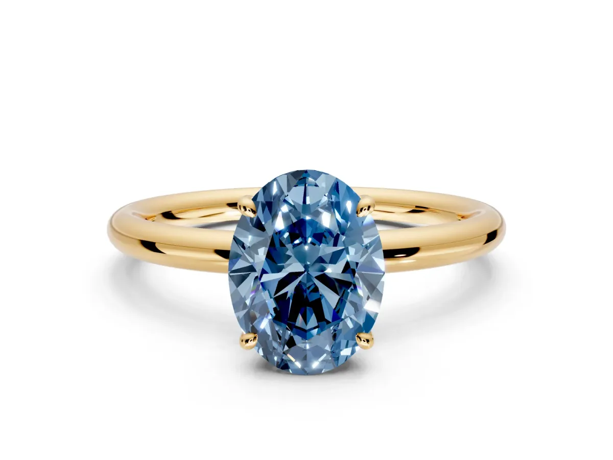 Hidden Halo Engagement Ring Setting for Fancy Blue Oval Center with Thin Rounded Band and Prong Head in Yellow Gold