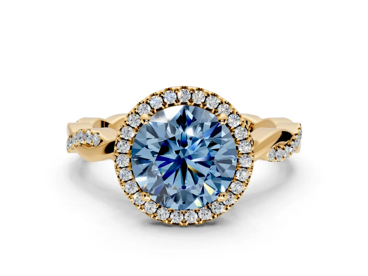 Halo Engagement Ring Setting for Fancy Blue Round Cut Center with Pave and Plain Twist Band and Prong Head in Yellow Gold