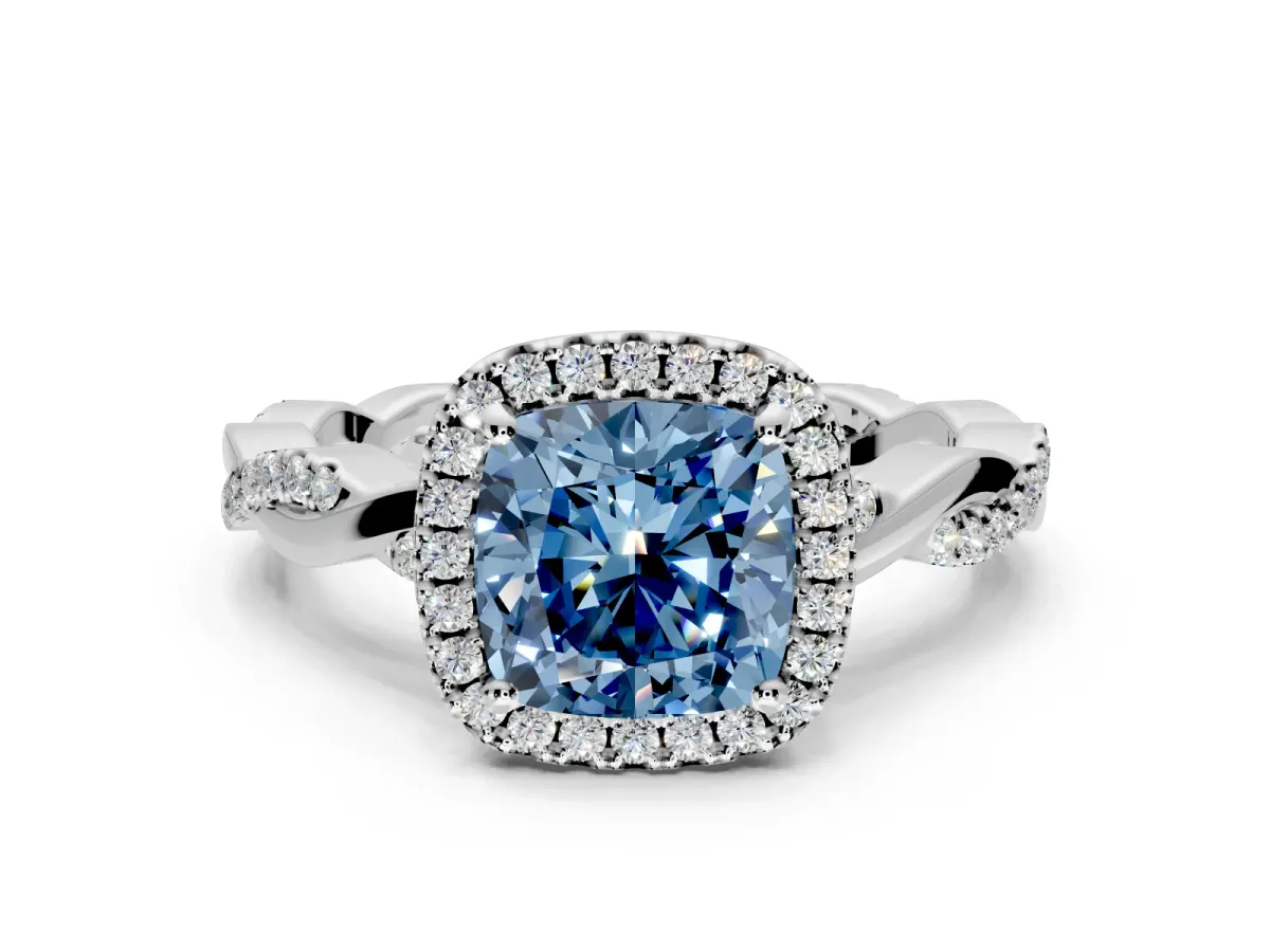 Halo Engagement Ring Setting for Fancy Blue Cushion Cut Center with Pave and Plain Twist Band and Prong Head in Sterling Silver