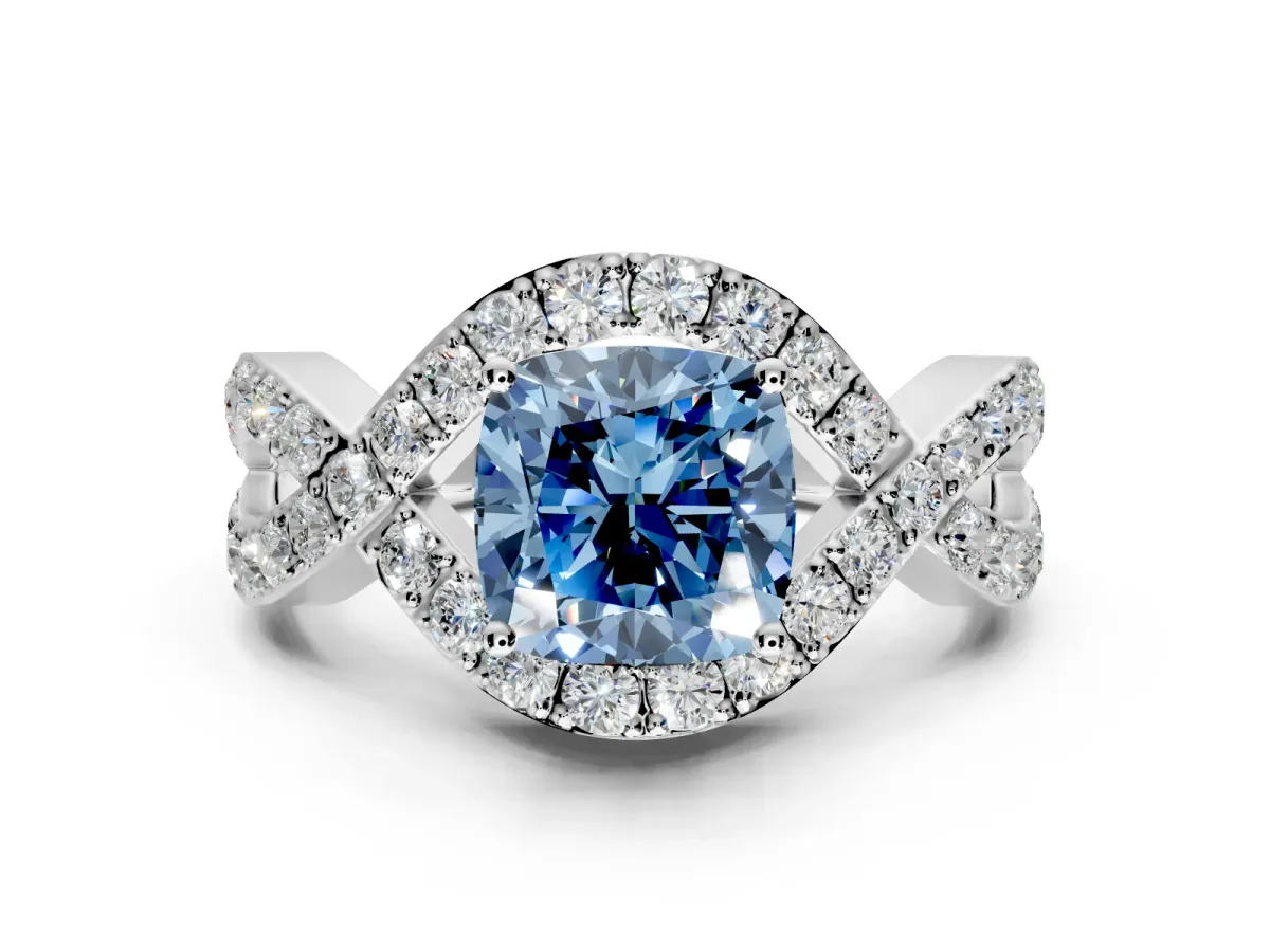 Halo Engagement Ring Setting for Fancy Blue Cushion Cut Center with Pave Infinity Twist Band and Prong Head in White Gold