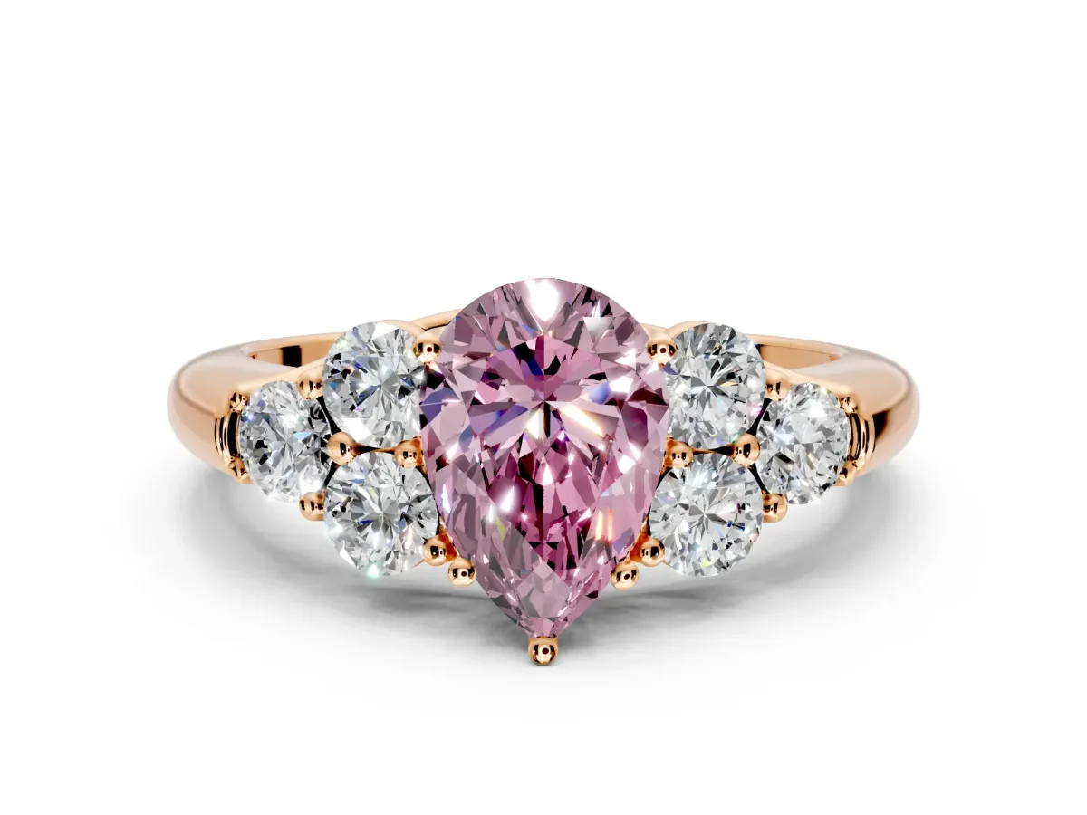 Cluster Engagement Ring Setting for Fancy Pink Pear-Shaped Center with Round Cut Accent Frame and Prong Head in Rose Gold