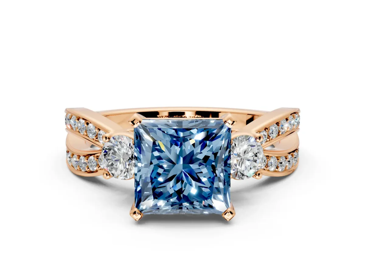 3 Stone Engagement Ring Setting for Fancy Blue Princess Cut Center with Pave Twist Band and Prong Head in Rose Gold