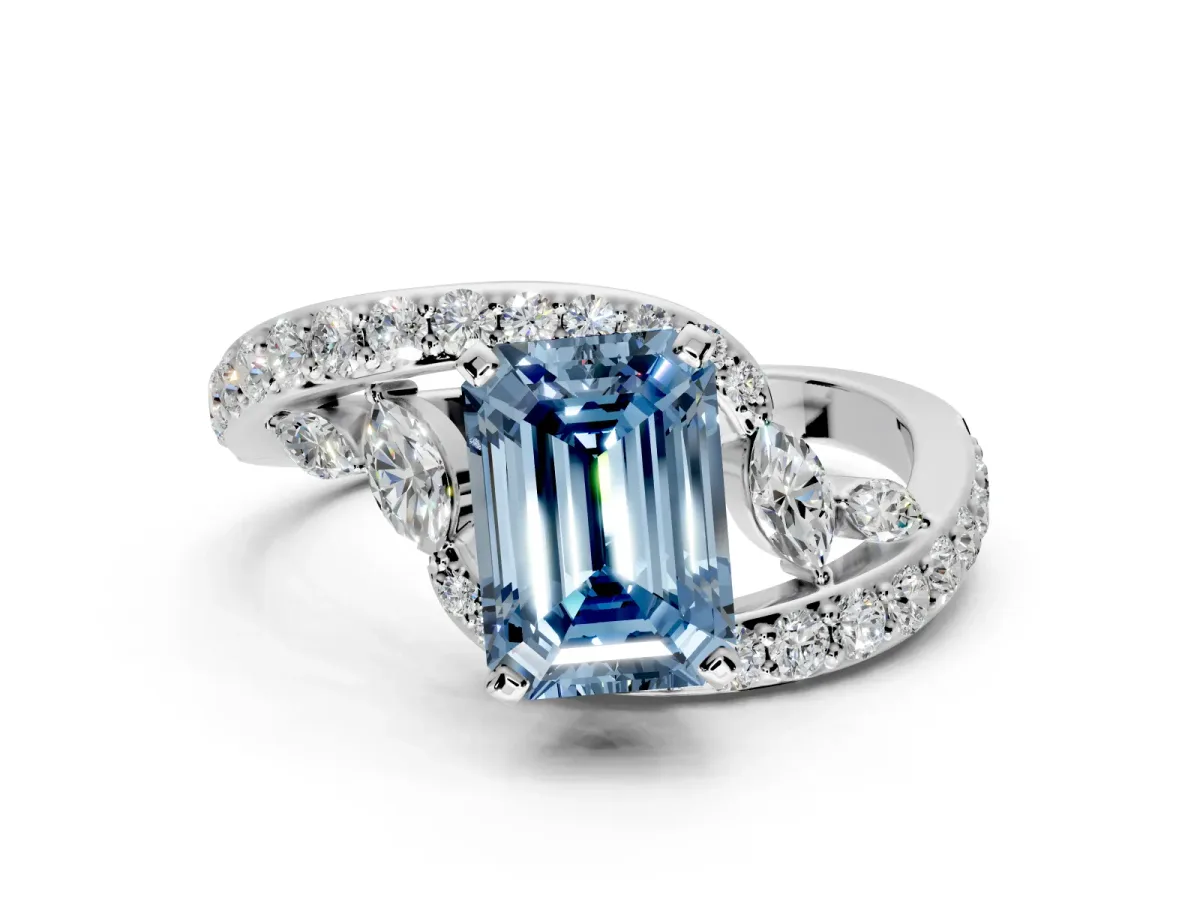 Solitaire Engagement Ring Setting for Fancy Blue Emerald Cut Center with Pave Bypass Twist Band and Prong Head in Sterling Silver