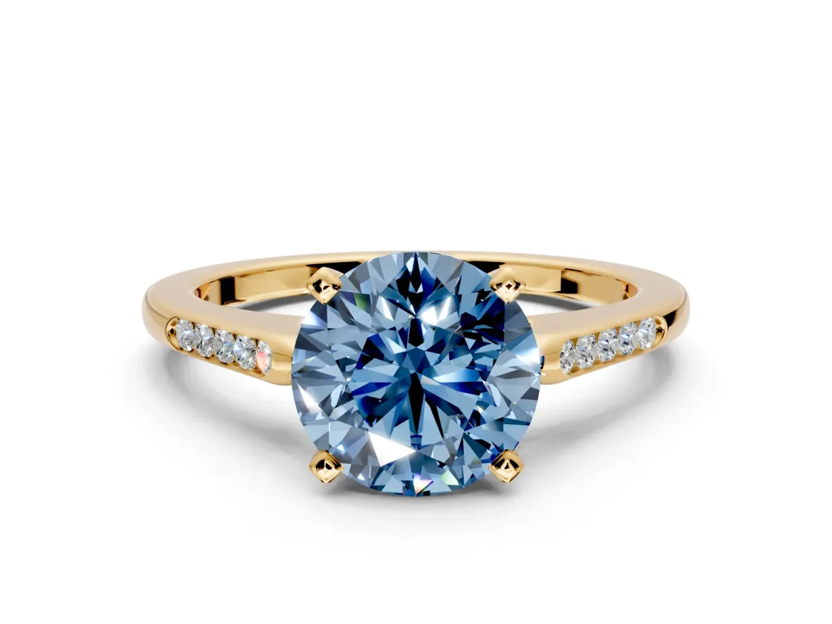 Solitaire Engagement Ring Setting for Fancy Blue Round Cut Center with Channel Accents and Prong Head in Yellow Gold