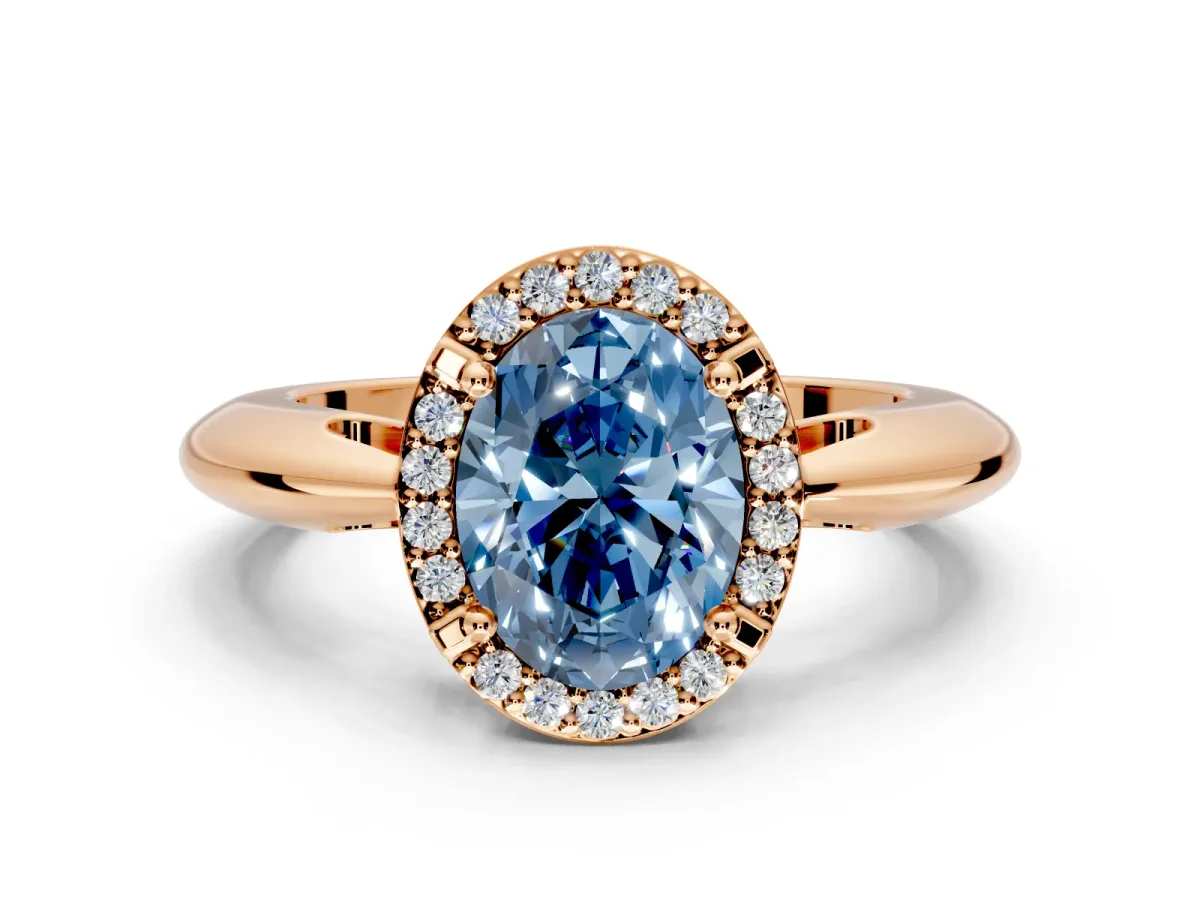 Halo Engagement Ring Setting for Fancy Blue Oval Center with Tapered Plain Band and Prong Head in Rose Gold