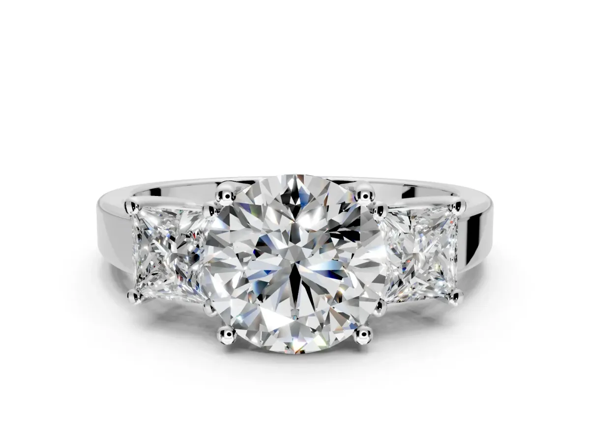 3 Stone Engagement Ring Setting for Round Cut Center with Matching Side Accents and Prong Head in Platinum