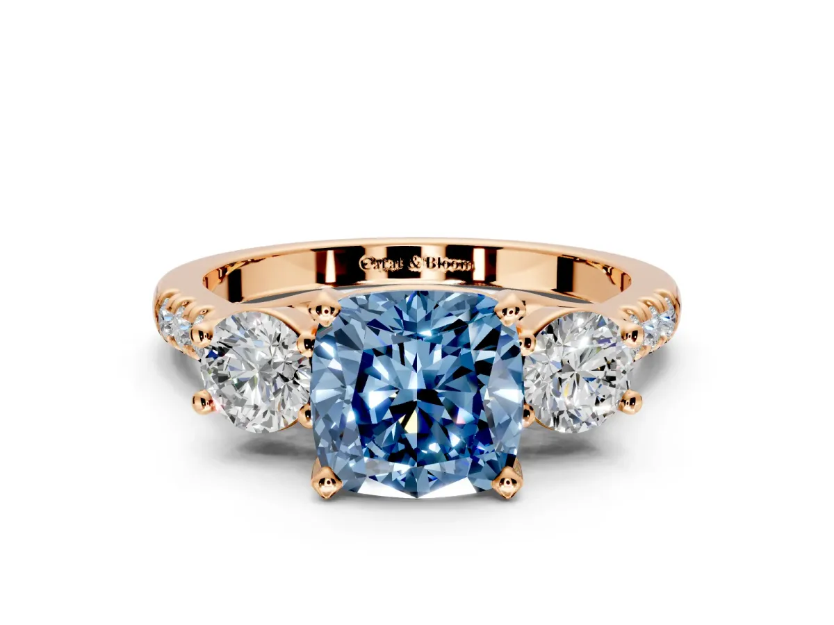 3 Stone Engagement Ring Setting for Fancy Blue Cushion Cut Center with Crossover Basket, Pave Band and Prong Head in Rose Gold