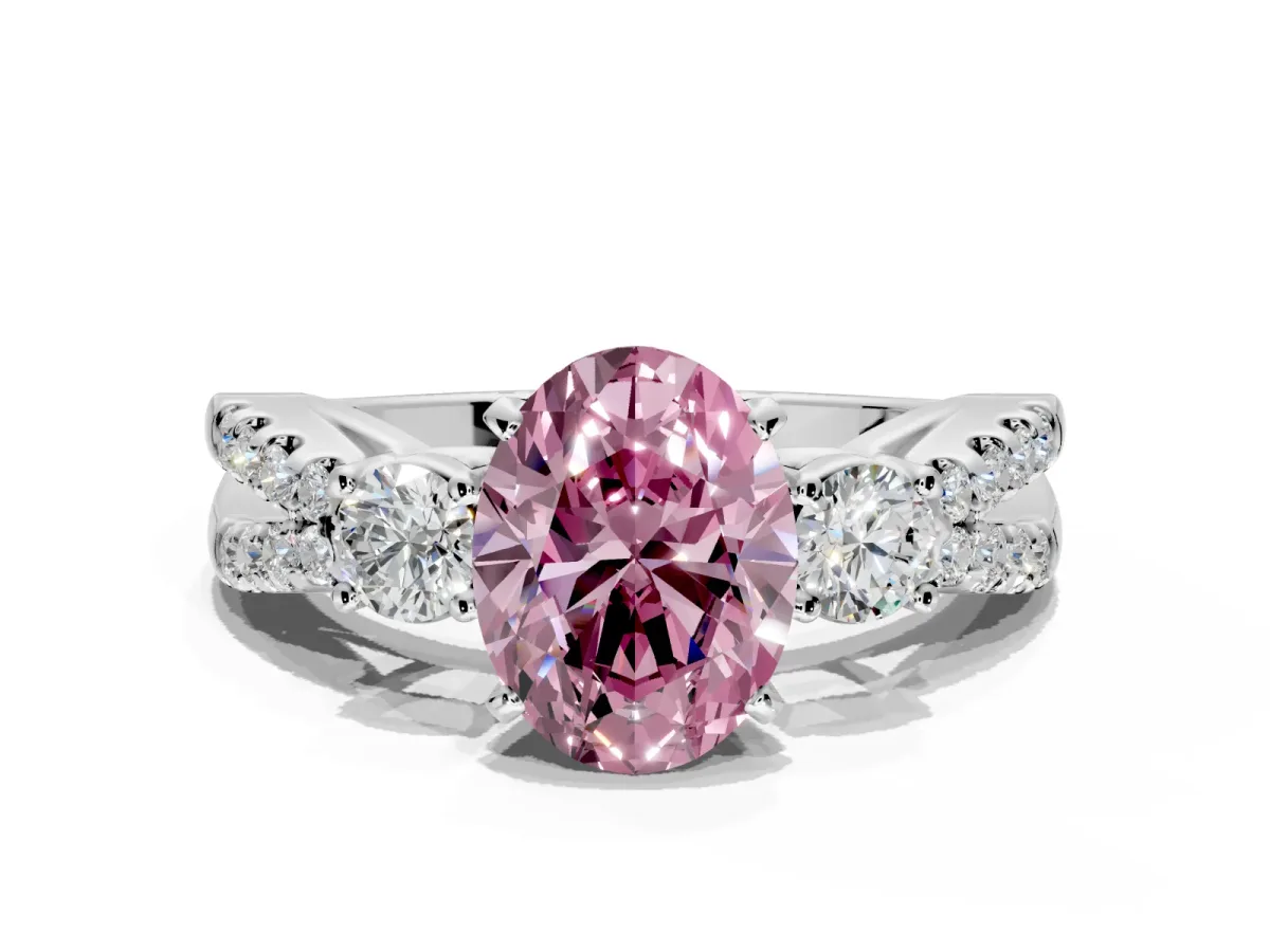 3 Stone Engagement Ring Setting for Fancy Pink Oval Center with Pave Split Shank and Prong Head in White Gold