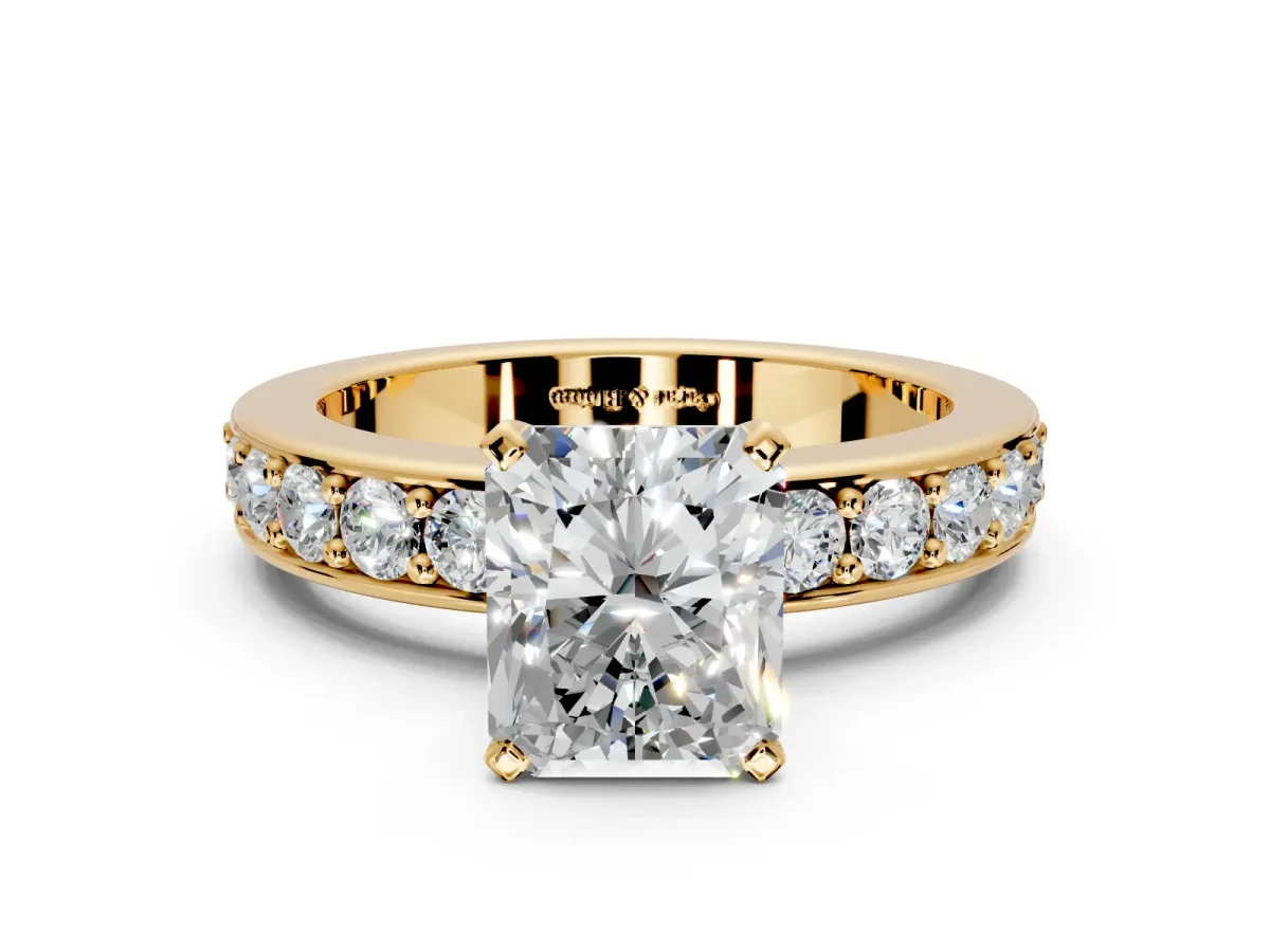 Solitaire Engagement Ring Setting for Radiant Cut Center with Channel-Set Accents and Prong Head in Yellow Gold