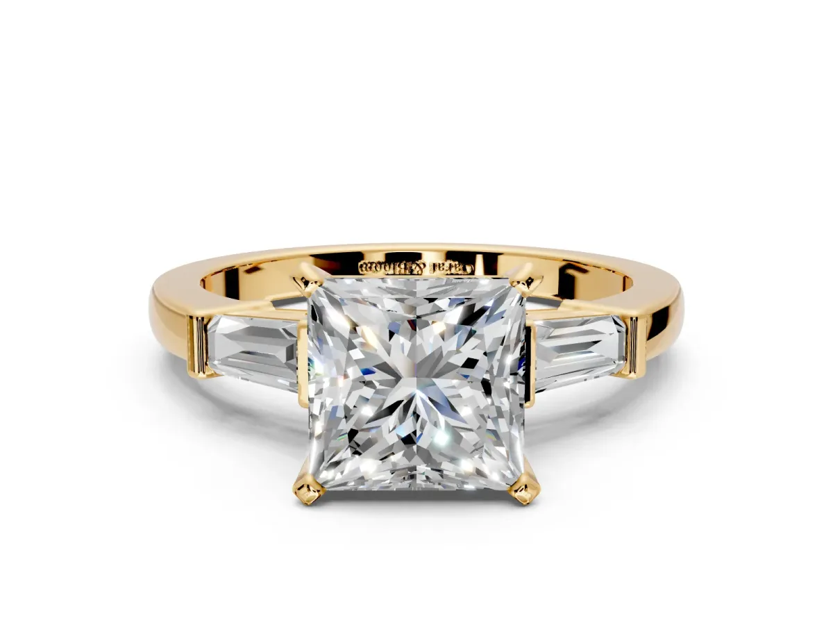 3 Stone Engagement Ring Setting for Princess Cut Center with Channel Baguette Accents and Prong Head in Yellow Gold