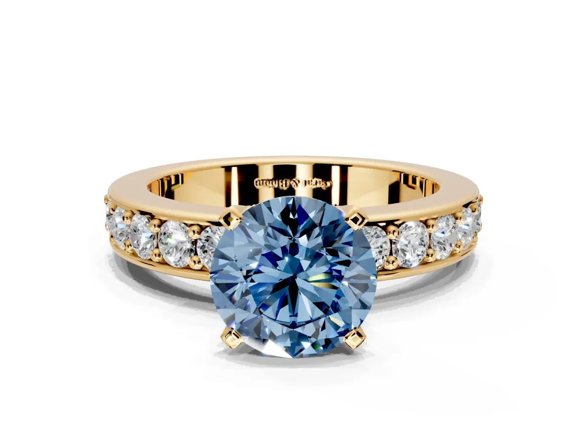 Solitaire Engagement Ring Setting for Fancy Blue Round Cut Center with Channel-Set Accents and Prong Head in Yellow Gold