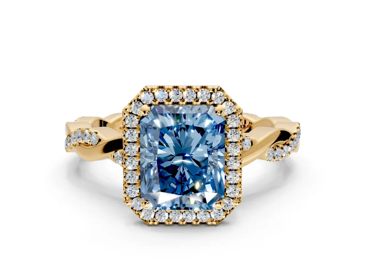 Halo Engagement Ring Setting for Fancy Blue Radiant Cut Center with Pave and Plain Twist Band and Prong Head in Yellow Gold