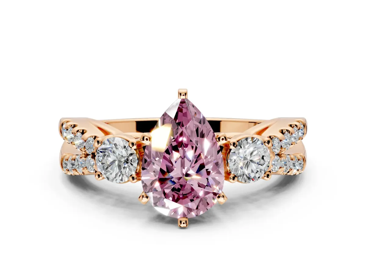 3 Stone Engagement Ring Setting for Fancy Pink Pear-Shaped Center with Pave Split Shank and Prong Head in Rose Gold